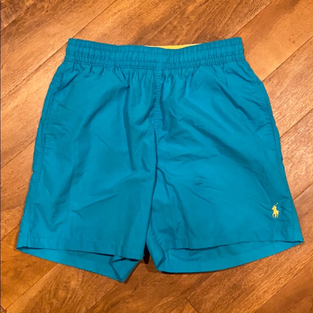 Sky blue (light blue) trunks with yellow Polo.
